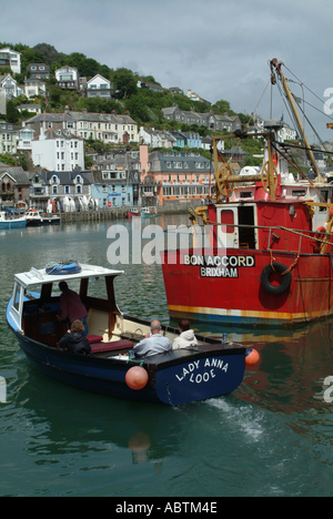 The Fishing Harbour Town of West Looe with Trawler and Small Ferry Boat Cornwall England United Kingdom UK Stock Photo