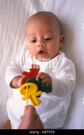 Baby with a toy Stock Photo