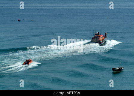 Mersey and D Class Lifeboats Leaving St Ives Harbour on Clear Sunny Day Cornwall Stock Photo