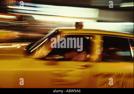 A classic Checker Marathon yellow New York cab at blurred speed Stock Photo