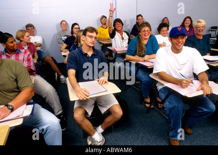 College class with students at desks during lecture Stock Photo