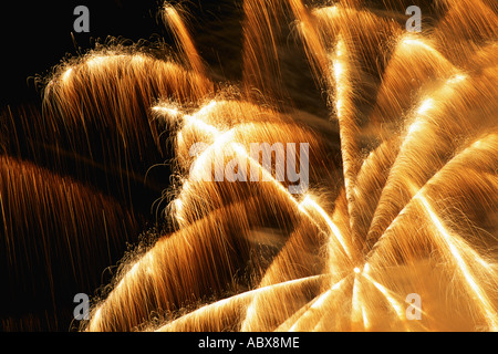 Colorful fireworks in sky at night Stock Photo