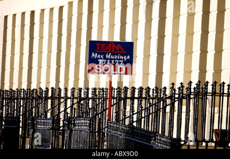 A Sold sign on one of the sought after houses in Brunswick Terrace on the seafront in the City of Brighton and Hove Stock Photo