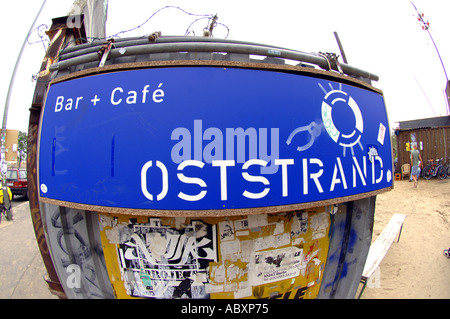 oststrand bar cafe sign blue berlin mauer berlin all ostbahnhof DDR former east berlin germany jail cell Stock Photo