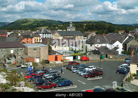 Llandovery looking down from castle ruins at town and car park with hills beyond Stock Photo