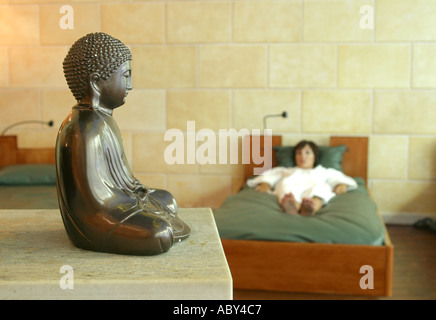 Young woman relaxing in wellness spa Stock Photo
