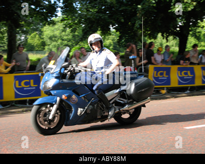 Gendarme riding a motorbike in the prologue of  the Tour De France 2007 Stock Photo