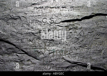 Graffiti on Old Slate Block Stock Photo