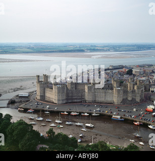 Caernarfon castle town Wales aerial view towards Angelsey Stock Photo