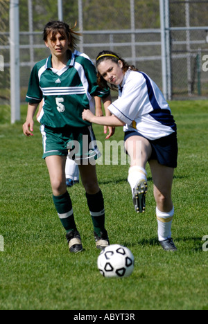 Girls high school soccer action Stock Photo