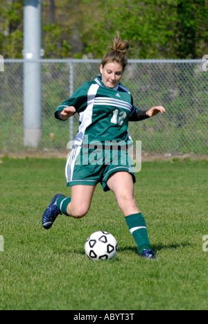 Girls high school soccer action Stock Photo