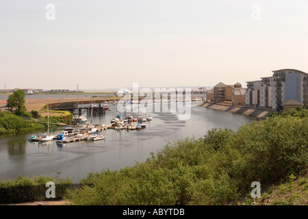 Wales Glamorgan Penarth waterfront pleasure boats on Ely River alongside new Marina housing development Stock Photo