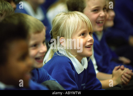 CHILDREN AT MANOR PRIMARY SCHOOL WOLVERHAMPTON UK ENJOYING THE CADBURYS PANTOMINE ROADSHOW Stock Photo