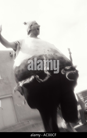 Fellini style portrait of levitating fat man Stock Photo