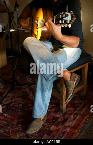 male guitar player in spanish bar Stock Photo