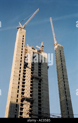 day Cranes constructing construction a new building in London England Britain United Kingdom UK Stock Photo