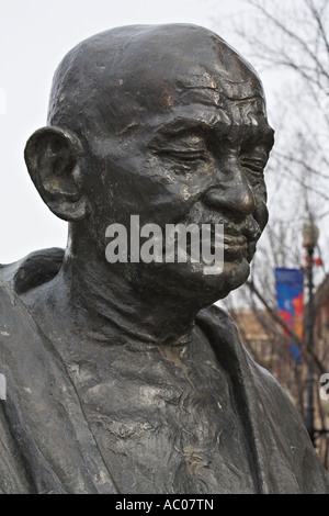 Prairie Gandhi Tribute. A large brass bust of Mahatma Gandhi found in a downtown square in Saskatoon Stock Photo