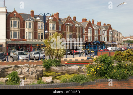Wales Glamorgan Barry Island seafront shops arcades and planted floral beds Stock Photo