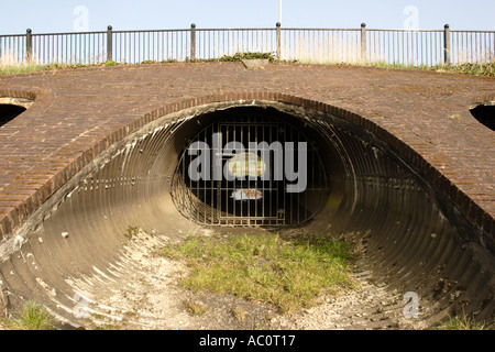 Drainage channels underneath the main road Stock Photo