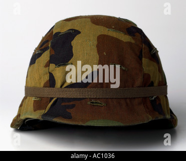 Hat Army Helmet K-Pot camouflaged personal armor head cover safety military hardhat  men women man woman silhouette Stock Photo