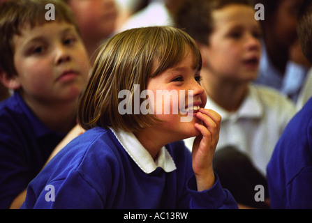 CHILDREN AT MANOR PRIMARY SCHOOL WOLVERHAMPTON UK ENJOYING THE CADBURYS PANTOMINE ROADSHOW Stock Photo