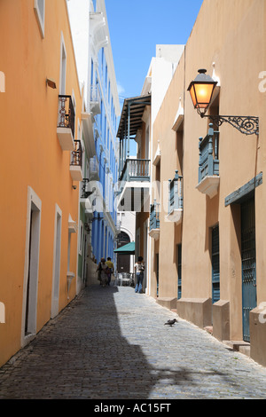 Cobblestone lane Colorful colonial architecture Old San Juan Puerto Rico Caribbean Stock Photo