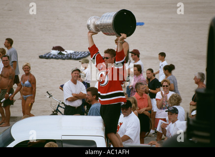 Chason Arnott holding up Stanley Cup at Parade in Wasaga Beach Ontario Canada on pickup truck with people around Stock Photo