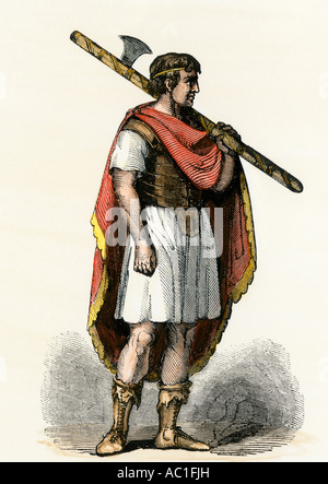 Roman lictor bearing the fasces the symbol of his office. Hand-colored woodcut Stock Photo