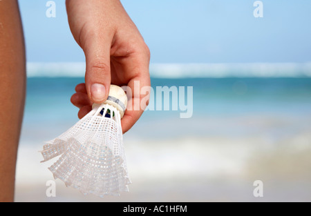 Woman holding shuttlecock, close-up Stock Photo