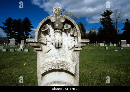 Old Headstone with a hand on it in a New England graveyard cemetery located in New Hampshire USA Stock Photo