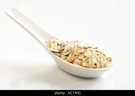 Whole grain oat flakes Stock Photo