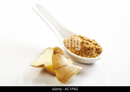 Fresh ginger roots and dried powder on white background Stock Photo - Alamy