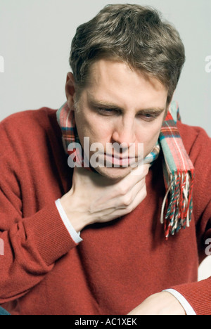 Man with a sore throat Stock Photo