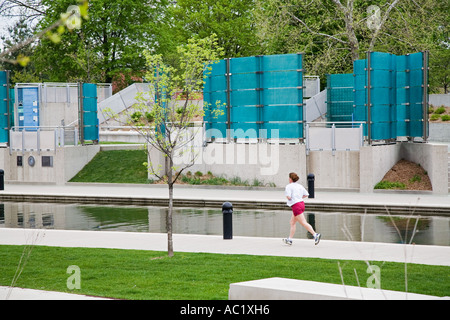 Indianapolis Indiana A woman runs along the historic Central Canal in downtown Indianapolis Stock Photo