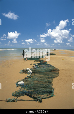 Fishing nets spread out to dry on the sandy beach Beira Mozambique Stock Photo