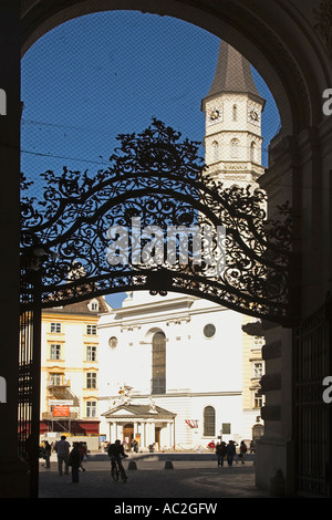 Vienna Hofburg wrought iron gate background Michaeler church Stock Photo