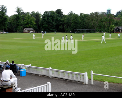 Cricket being played at the cadbury sports club at Bournville Stock Photo