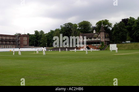 Cricket being played at the cadbury sports club at Bournville Stock Photo