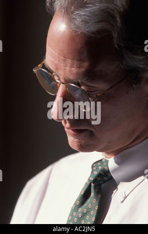 Caucasian businessman takes a moment to reflect Stock Photo