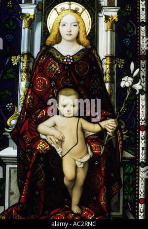 Intricate stained glass window of the Madonna and Child in a gallery at the Vatican Museums, Vatican City, Rome, Italy. Stock Photo