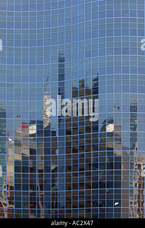 City scape reflections on glass highrise look like a bar chart portrait Stock Photo
