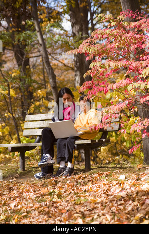 Mother and son doing homework on a computer Stock Photo