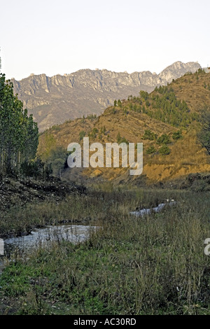 CHINA SIMATAI The Great Wall of China as seen outlined along nearby mountains at sunrise Stock Photo