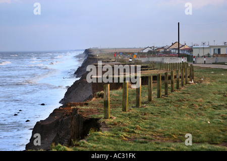 Coastal erosion on east coast threatening houses. Stock Photo