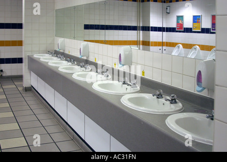 Hand washing sinks in male public convenience.