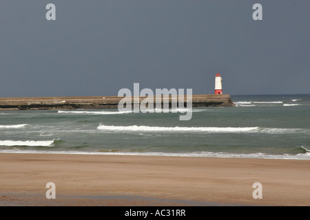 Storm clouds over the sea and beach near Berwick. Stock Photo