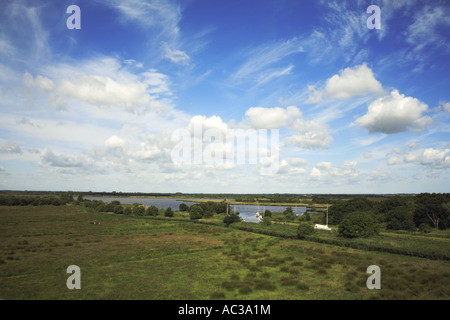 A view of Horsey Mere and boat dyke with grazing marshes on the Norfolk Broads from the windmill at Horsey, Norfolk, England, United Kingdom, Europe. Stock Photo