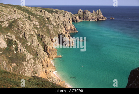 A view over Treen beach to Logan Rock near Penzance Cornwall Great Britain Stock Photo