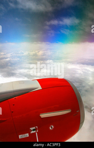 Jet Aircraft window view of engine polarised blue sky and clouds over Europe from 30 000 feet transport sky cloud blue Stock Photo