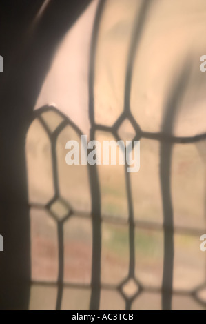 Reflection of a window in brass Stock Photo